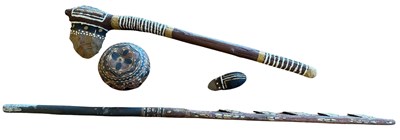 Lot 100 - A Carved Peruvian Gourd & Three Indigenous Items.