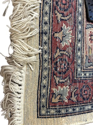 Lot 136 - Handwoven Wool Silk Blend Rug.