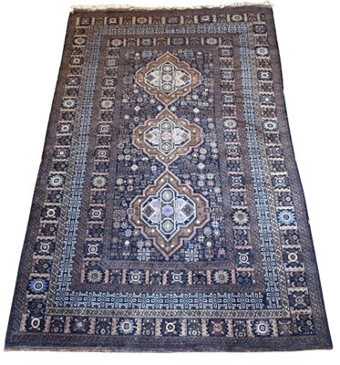 Lot 135 - Large Earth-Toned Wool Rug.