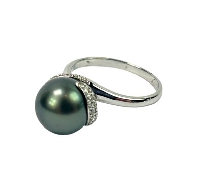 Lot 232 - Pearl and Diamond Ring.