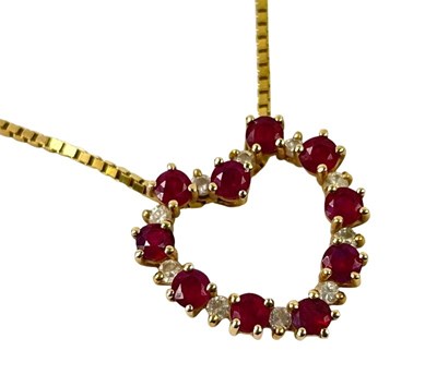 Lot 267 - A Diamond & Ruby Heart Pendant with Box Link Chain.