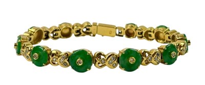 Lot 284 - Diamond and Jade Bracelet.