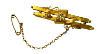 Lot 246 - A 15ct Gold & Diamond Brooch.