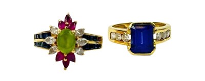 Lot 253 - A Pair of 18ct Coloured Gemstone Rings.