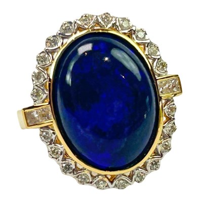 Lot 217 - Natural Black Opal Ring.