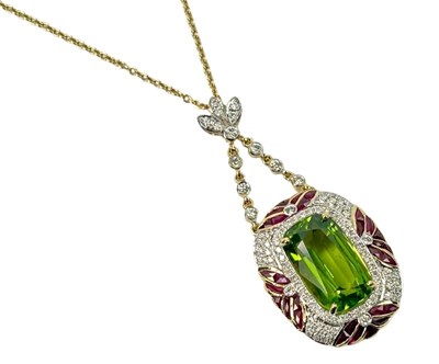 Lot 213 - An 18ct Precious Peridot Pendant.