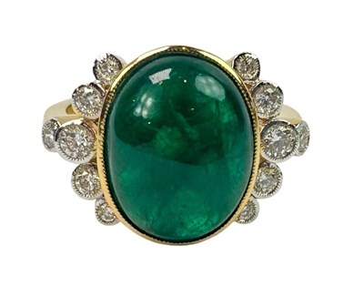 Lot 220 - A Double Cabochon Cut Emerald Ring.