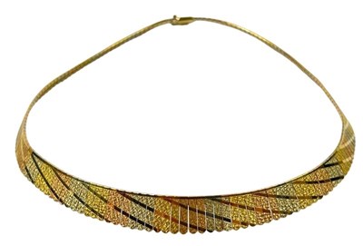 Lot 301 - A Triple Colour Gold Necklet.