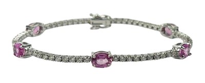 Lot 307 - A Pink Sapphire & Diamond Bracelet.
