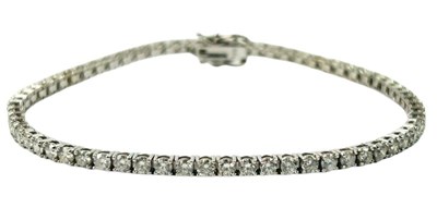 Lot 256 - A Diamond Tennis Bracelet.