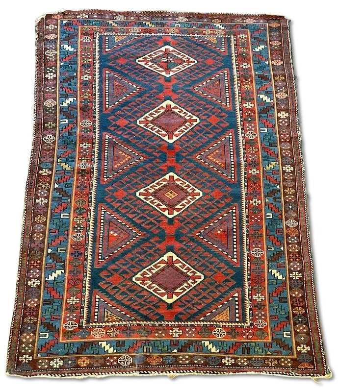 Lot 140 - Vibrant Handwoven Rug.