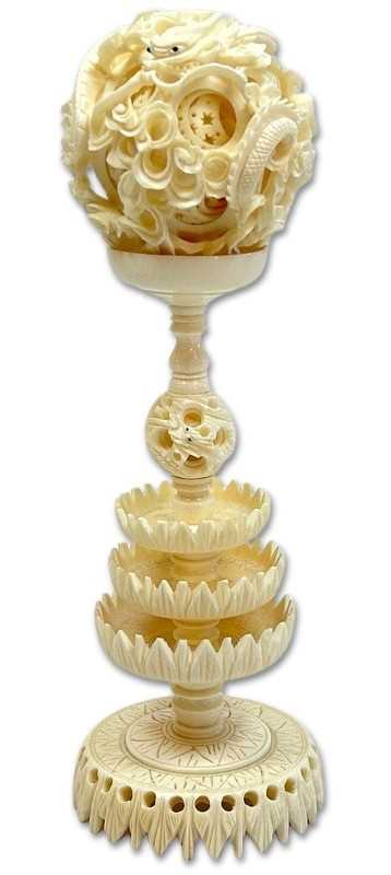 Lot 156 - Intricately Carved Ivory Dragon Puzzle Ball with Stand.