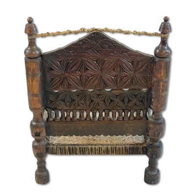 Lot 125 - Hand Carved Traditional Low Chair.