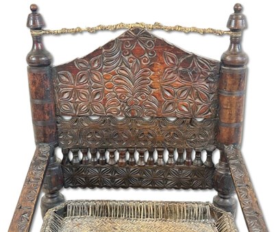 Lot 125 - Hand Carved Traditional Low Chair.