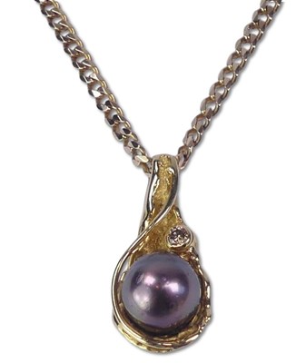 Lot 224 - Pearl and Diamond Pendant.