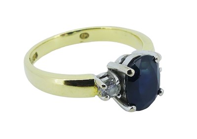 Lot 121 - Sapphire and Diamond Ring.