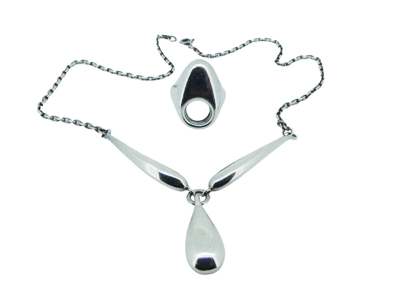 Lot 82 - Silver Ring and Necklace.