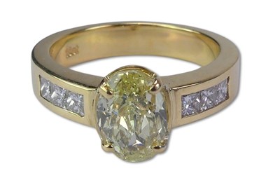 Lot 238 - Fancy Yellow Diamond Ring.