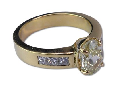 Lot 238 - Fancy Yellow Diamond Ring.