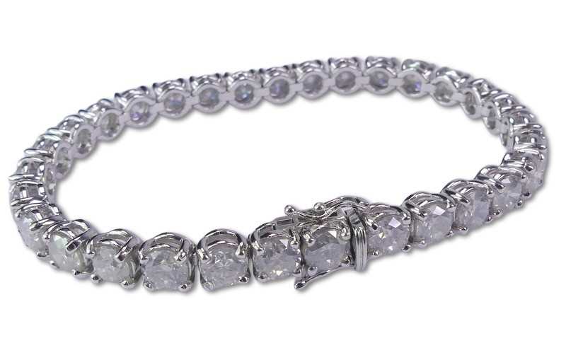 Lot 275 - A Large Diamond Tennis Bracelet.