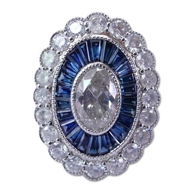 Lot 252 - 14ct White Gold Sapphire and Diamond Cluster Ring.