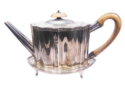 Lot 259 - Sterling Silver Tea Pot and Teapot Rest.