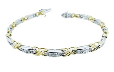 Lot 123 - Yellow and White Gold Segmented Bracelet.