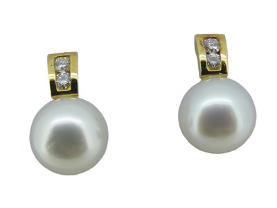 Lot 230 - Pearl and Diamond Earrings.