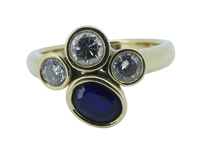 Lot 157 - Distinctive Diamond and Sapphire Ring.