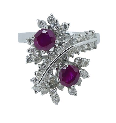 Lot 165 - Diamond and Ruby Cross-Over Cluster Ring.