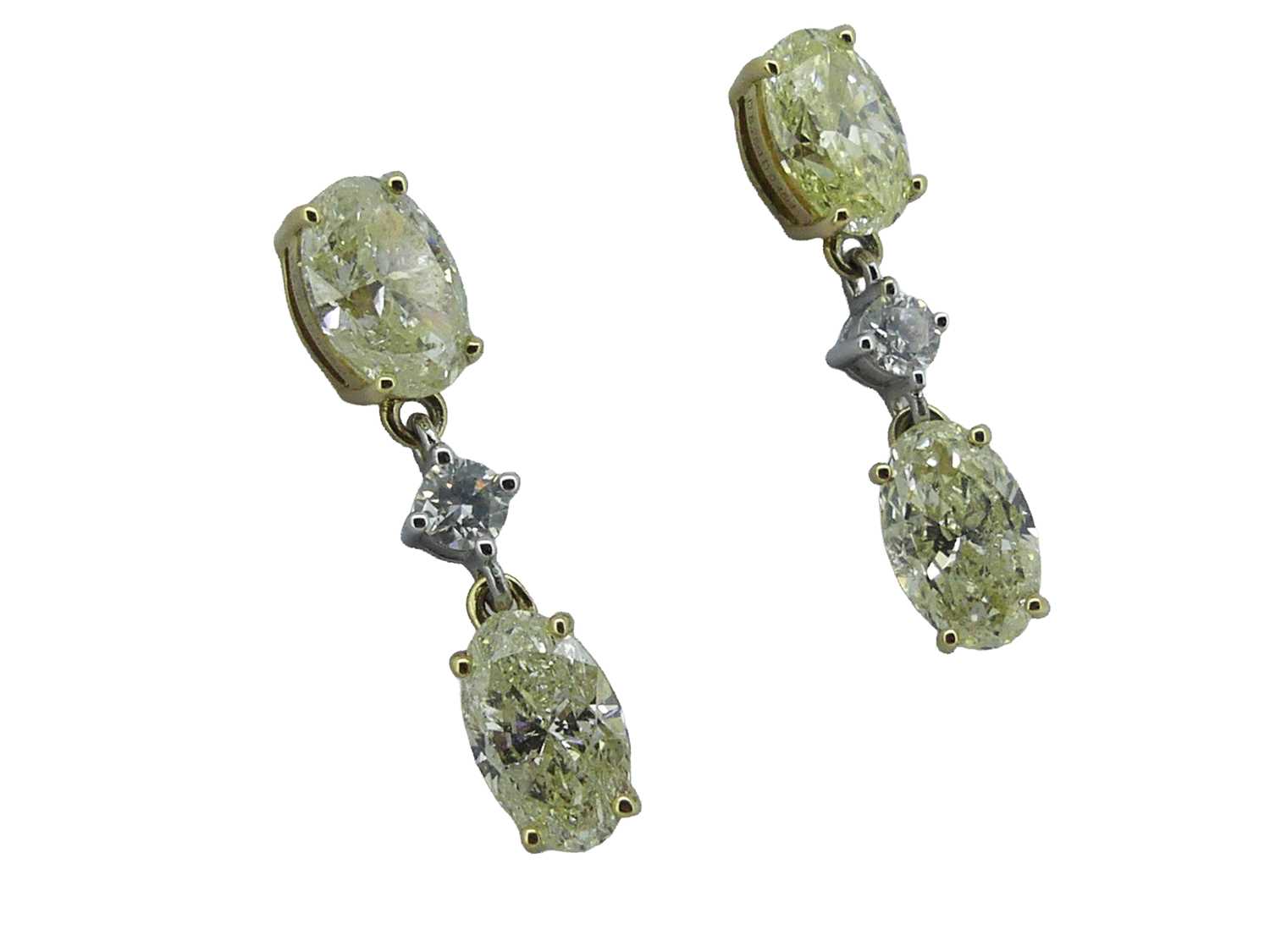 Lot 54 - Yellow and White Gold Diamond Earrings.