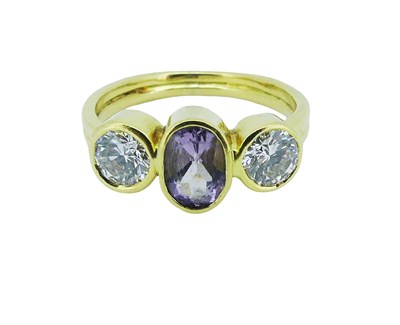Lot 185 - Diamond and Amethyst Ring.