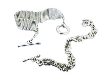 Lot 114 - Two Decorative Silver Bracelets.