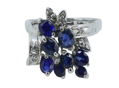 Lot 190 - Diamond and Sapphire Ring.