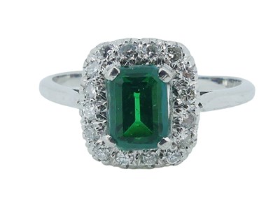 Lot 85 - Emerald Doublet and Diamond Ring.