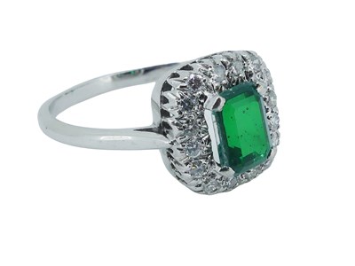 Lot 85 - Emerald Doublet and Diamond Ring.