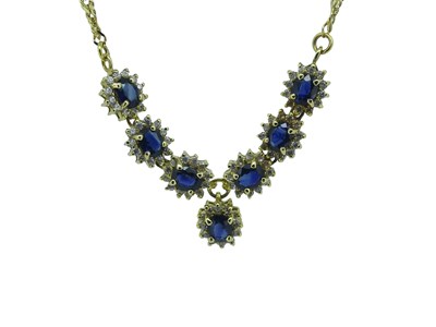 Lot 61 - Sapphire and Zirconia Necklace and Earrings.