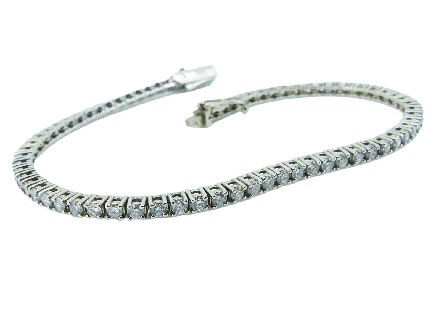 Lot 24 - Diamond Tennis Bracelet.