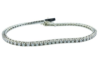 Lot 24 - Diamond Tennis Bracelet.