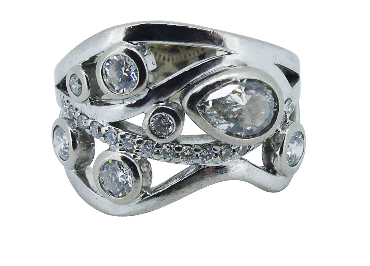 Lot 149 - Freeform Designed Diamond Ring.