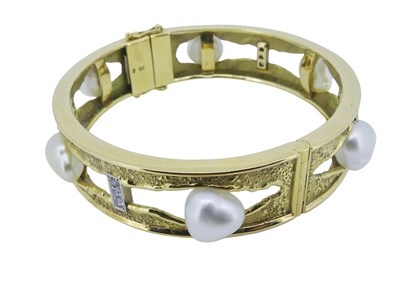 Lot 46 - Substantial Pearl and Diamond Bangle.