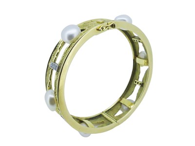 Lot 46 - Substantial Pearl and Diamond Bangle.