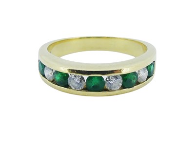 Lot 168 - Good Quality Emerald and Diamond Eternity Ring.