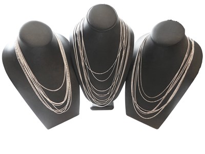 Lot 130 - A Collection of Sterling Silver Fine Chains and Earrings.