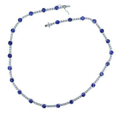 Lot 77 - Diamond and Sapphire Tennis Style Necklace.