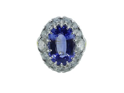 Lot 101 - Large Natural Sapphire Cluster Ring.