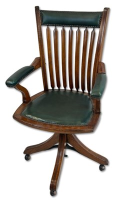 Lot 145 - Walnut Swivel Arrow Back Office Chair.