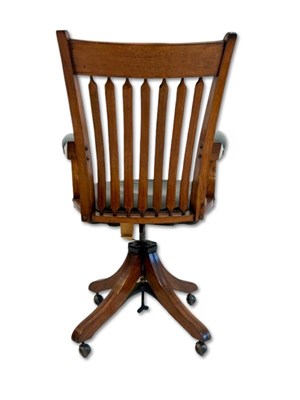 Lot 145 - Walnut Swivel Arrow Back Office Chair.