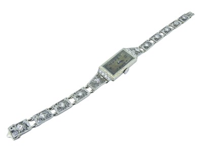 Lot 15 - A White Gold Bracelet Watch.