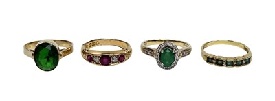 Lot 242 - Four Gem Set Rings.